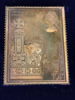 Lot 9 - A GOLD AND SILVER STAMP SET