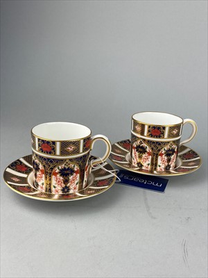 Lot 125 - A PAIR OF ROYAL CROWN DERBY IMARI PATTERN COFFEE CUPS AND SAUCERS