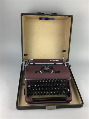 Lot 137 - AN OLYMPIA TYPEWRITER IN CASE