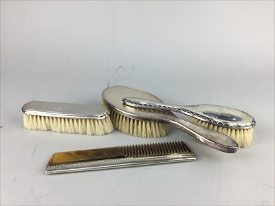 Lot 176 - A SILVER THREE PIECE BRUSH SET AND ANOTHER BRUSH