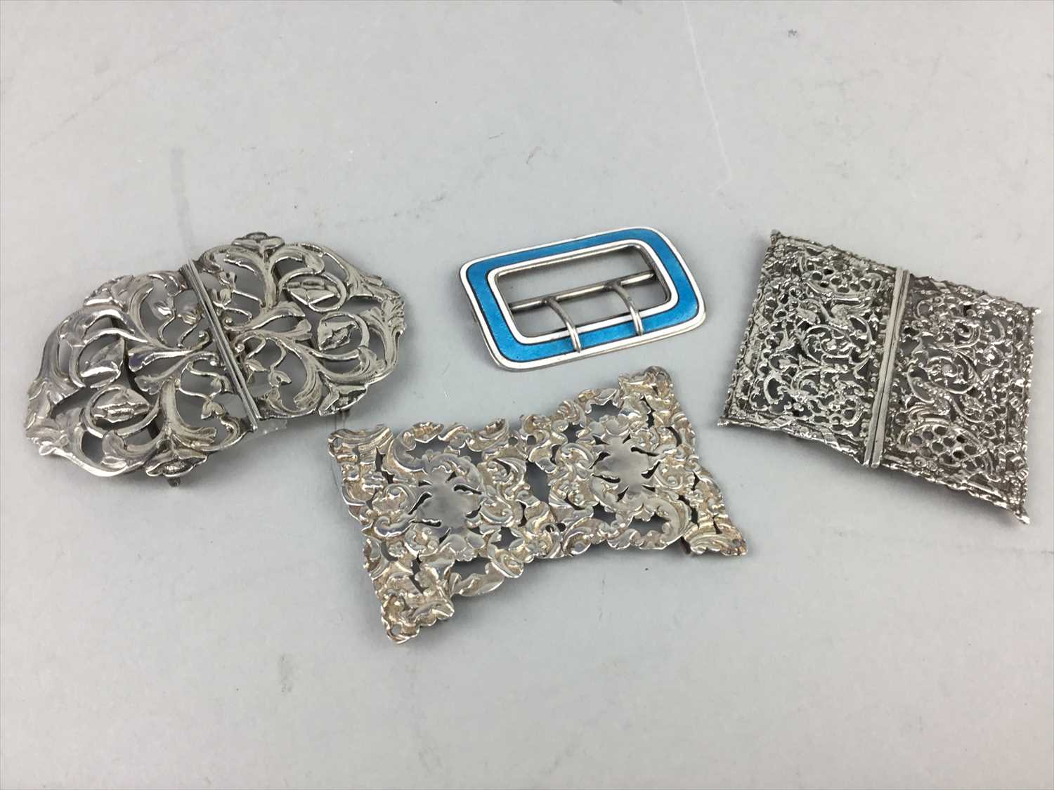 Lot 15 - A LOT OF FOUR SILVER BUCKLES