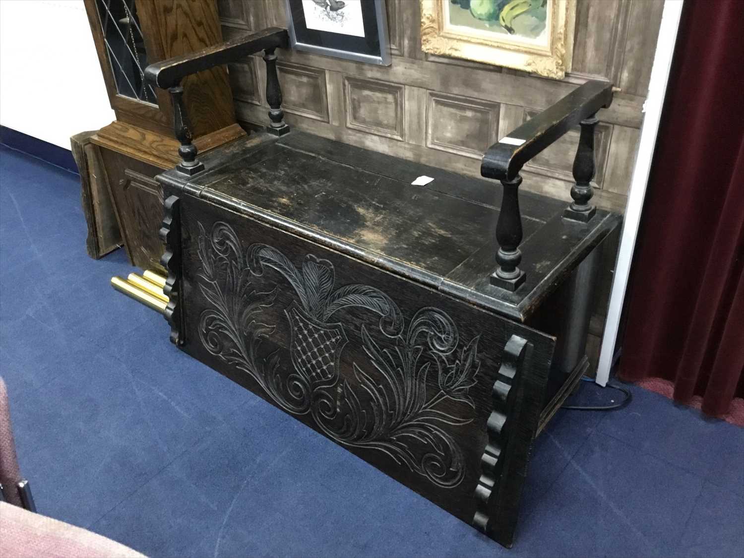 Lot 198 - A STAINED OAK MONKS BENCH