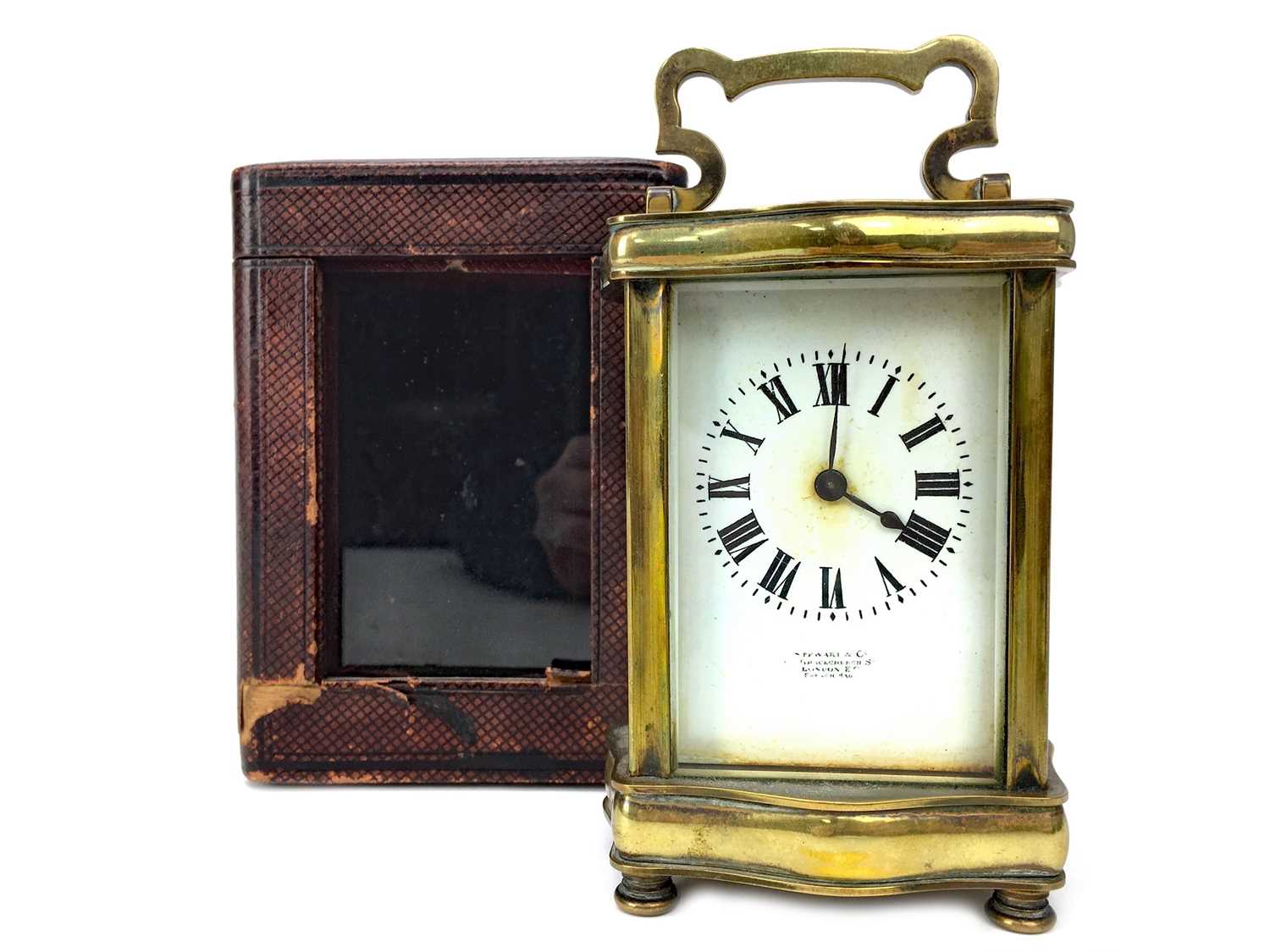 Lot 1128 - AN EARLY 20TH CENTURY BRASS CARRIAGE CLOCK