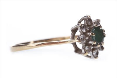 Lot 368 - A GREEN GEM SET AND DIAMOND CLUSTER RING