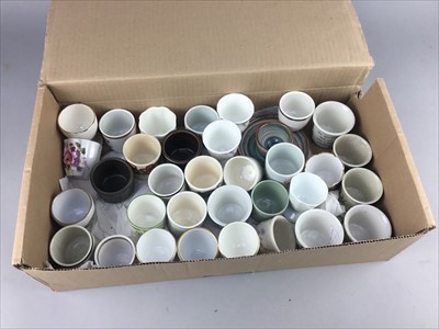 Lot 334 - A COLLECTION OF EGG CUPS AND OTHER CERAMICS