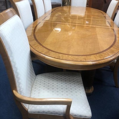Lot 304 - A MODERN MAPLE DINING SUITE