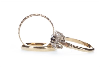 Lot 386 - TWO WEDDING BANDS AND A GEM SET CLUSTER RING