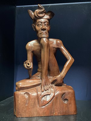 Lot 422 - A 20TH CENTURY AFRICAN CARVED WOOD FIGURE OF A MAN