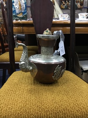 Lot 429 - A 20TH CENTURY TIBETAN COPPER AND WHITE METAL MOUNTED EWER