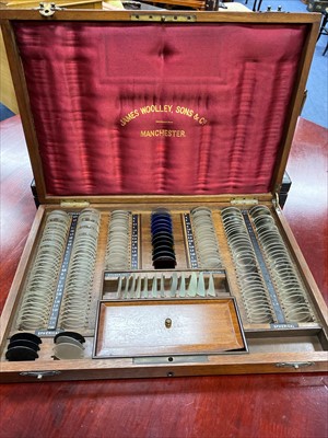 Lot 483 - A 19TH CENTURY OPTICIANS LENS SET BY JAMES WOOLLEY SONS & CO AND ANOTHER SET