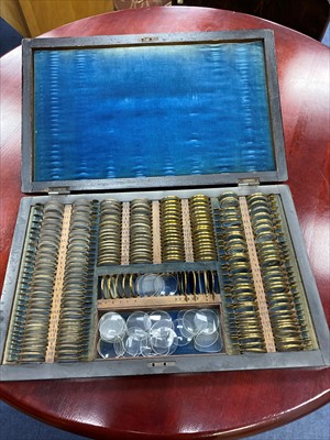 Lot 483 - A 19TH CENTURY OPTICIANS LENS SET BY JAMES WOOLLEY SONS & CO AND ANOTHER SET