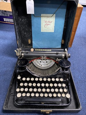 Lot 495 - AN UNDERWOOD PORTABLE TYPEWRITER AND A TAPE DECK