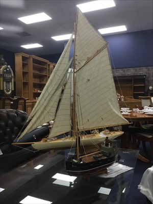 Lot 441 - A STAINED WOOD MODEL OF A J-YACHT 1901 AND A MODEL OF A CLYDE PUFFER