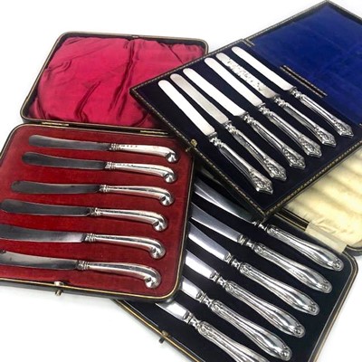 Lot 449 - A LOT OF THREE CASED SETS OF SILVER MOUNTED TEA KNIVES