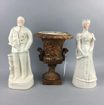 Lot 271 - A PAIR OF STAFFORDSHIRE FIGURES AND AN URN