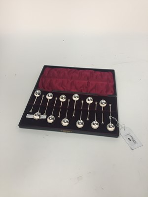Lot 451 - A CASED SET OF TWELVE SILVER SEAL TOP COFFEE SPOONS