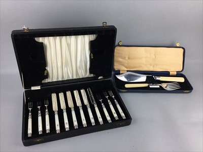Lot 70 - A SILVER PLATE AND MOTHER OF PEARL FRUIT KNIVES AND FORKS ALONG WITH A SERVING SET