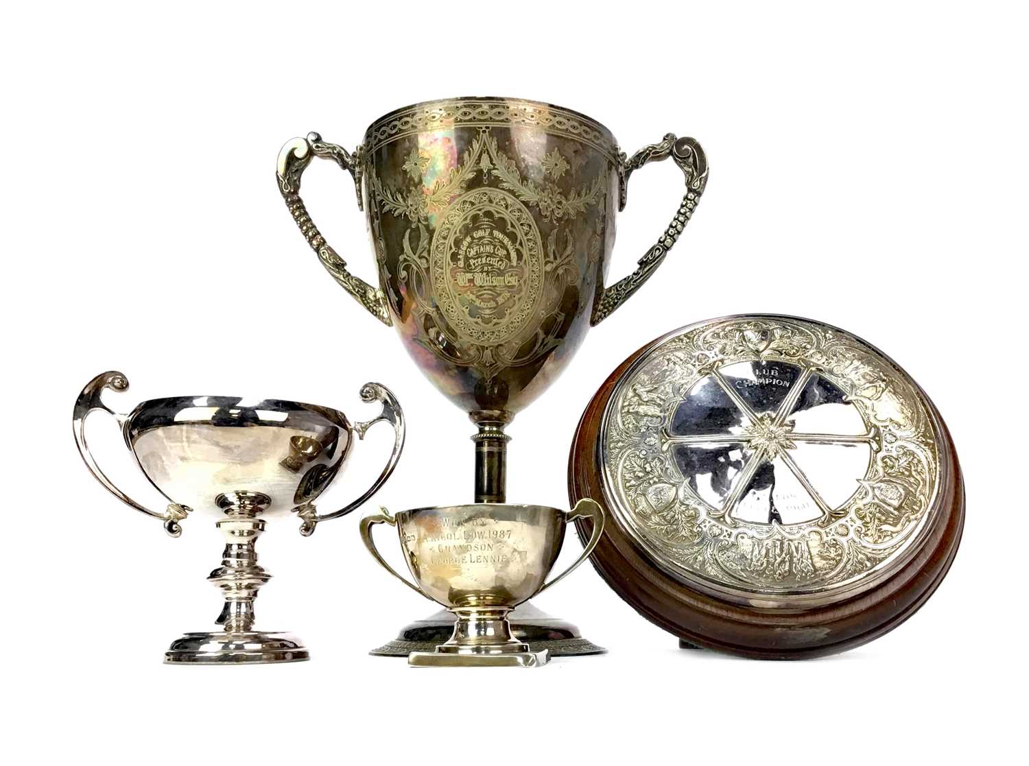 Lot 1708 - A VICTORIAN SILVER PLATED GOLFING TROPHY ALONG WITH THREE OTHERS
