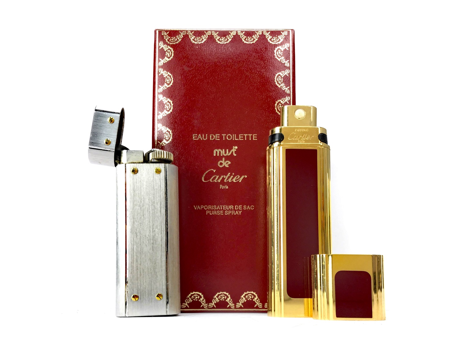 Lot 1615 A MUST DE CARTIER PERFUME ATOMISER AND