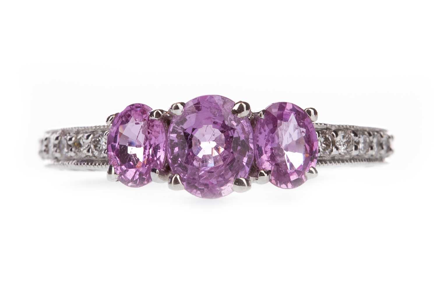 Lot 460 - A PINK SAPPHIRE AND DIAMOND RING
