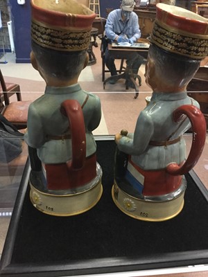 Lot 1043 - A PAIR OF WWI PERIOD WILKINSON CHARACTER JUGS