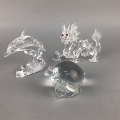 Lot 273 - A SWAROVSKI DRAGON, DOLPHIN AND A GLASS PAPERWEIGHT