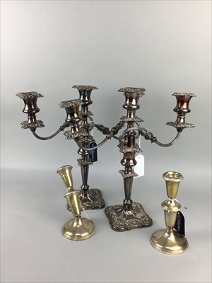 Lot 105 - A PAIR OF PLATED TABLE CANDELABRA AND A PAIR OF STERLING CANDLESTICKS