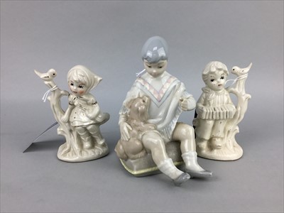 Lot 95 - A ROYAL DOULTON FIGURE OF 'A GOOD CATCH' AND THREE OTHER FIGURES