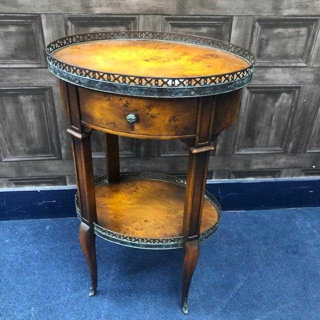 Lot 207 - A WALNUT OVAL TWO TIER OCCASIONAL TABLE