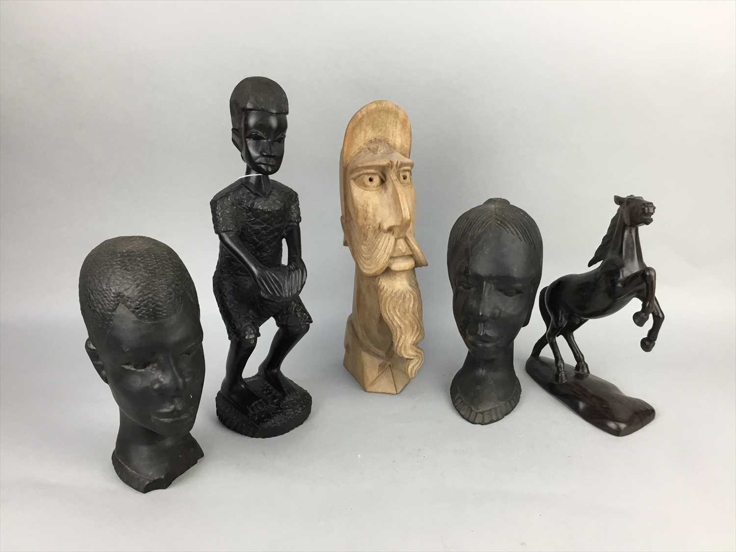 Lot 177 - A LOT OF FOUR AFRICAN WOOD CARVINGS ALONG WITH ANOTHER