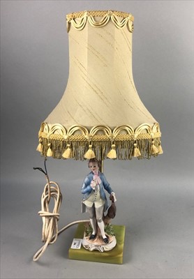 Lot 306 - A FIGURAL TABLE LAMP ON AN ONYX BASE AND TWO OTHER TABLE LAMPS
