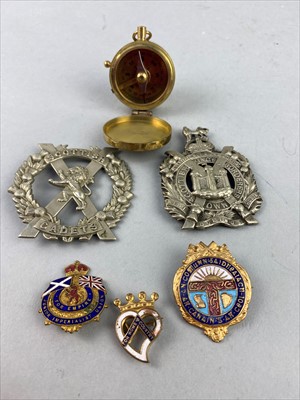 Lot 219 - A GROUP OF MILITARY AND OTHER BADGES AND A REPRODUCTION COMPASS