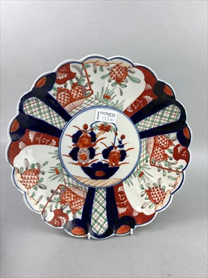 Lot 173 - A JAPANESE CERAMIC WALL PLATE AND ANOTHER