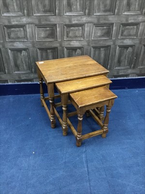 Lot 253 - A STAINED WOOD NEST OF TABLES, WRITING SLOPE AND OTHER ITEMS