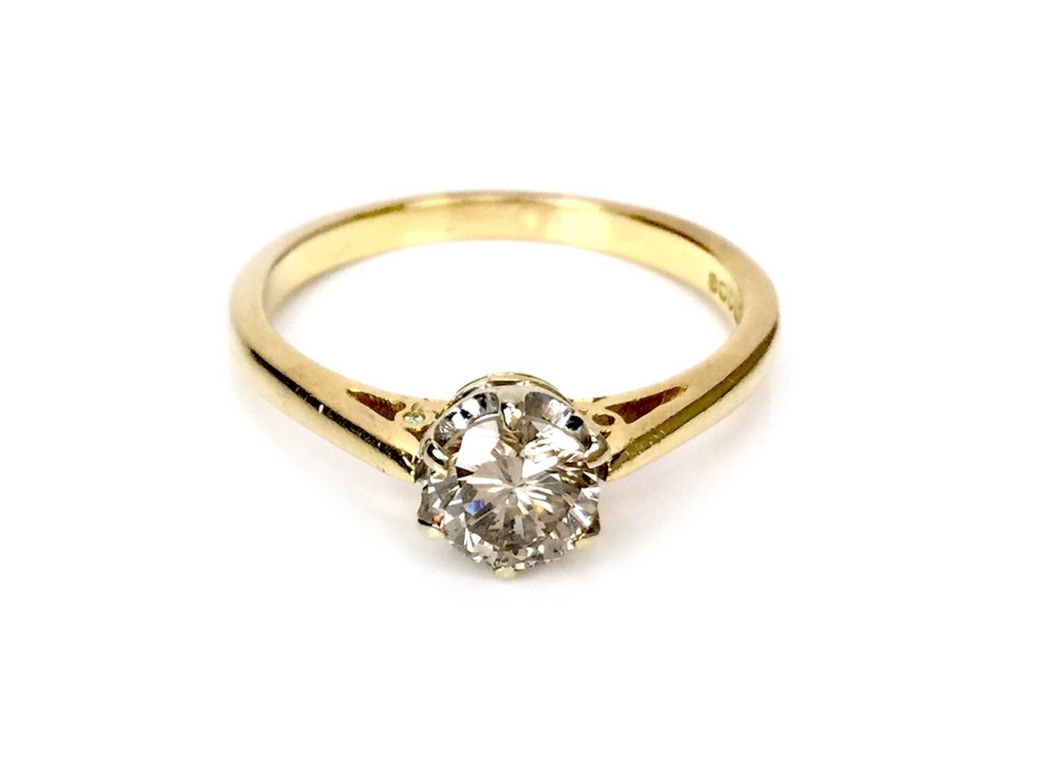 Lot 1314 - A DIAMOND SOLITAIRE RING