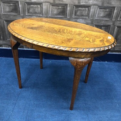 Lot 147 - AN OAK OVAL OCCASIONAL TABLE AND A MODERN OAK COFFEE TABLE