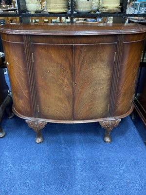 Lot 464 - A MAHOGANY DEMI LUNE CUPBOARD