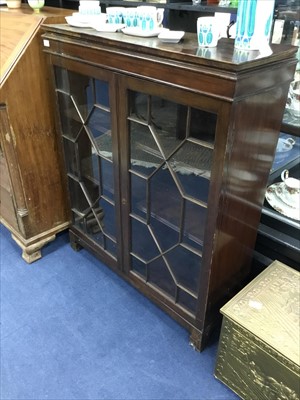 Lot 465 - A MAHOGANY TWO DOOR BOOKCASE