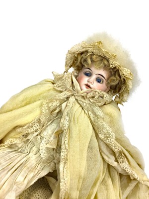 Lot 1632 - AN EARLY 20TH CENTURY GERMAN BISQUE HEADED DOLL