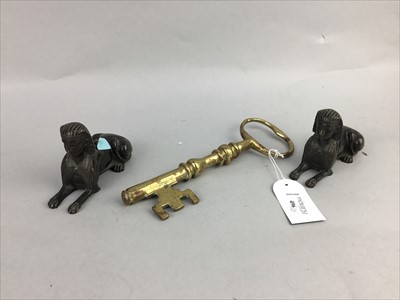 Lot 496 - A LARGE BRASS KEY, BRASS BELT BUCKLES AND OTHER ITEMS