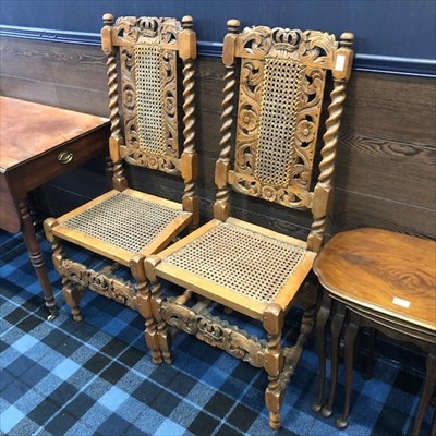 Lot 405 - A PAIR OF 19TH CENTURY CARVED OAK HALL CHAIRS