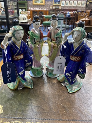 Lot 419 - A PAIR OF JAPANESE CERAMIC FIGURES AND A PAIR OF CHINESE FIGURES