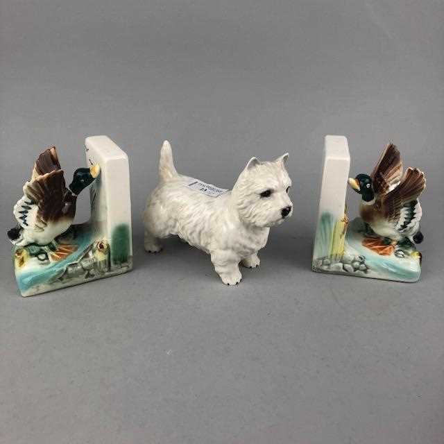 Lot 23 - A BESWICK SCOTTISH TERRIER DOG, A PAIR OF BOOKENDS AND OTHER ITEMS