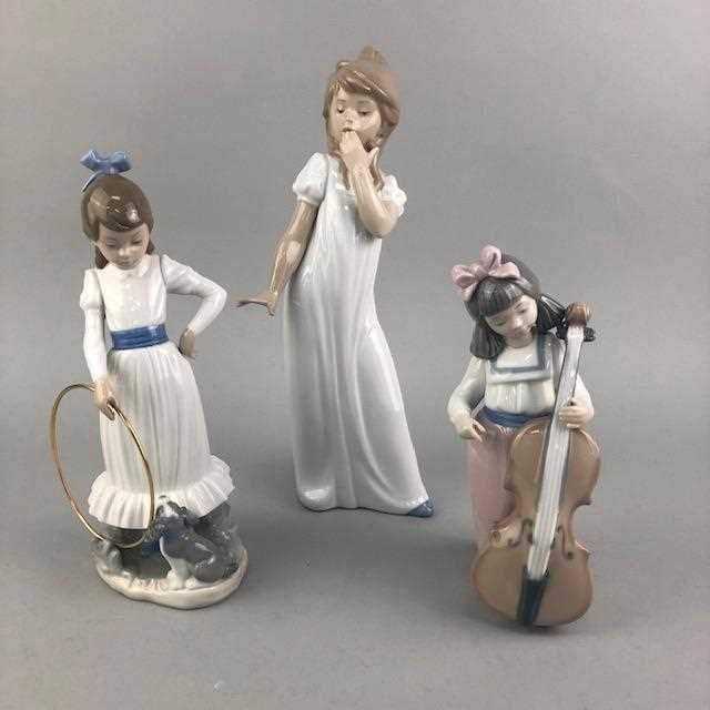 Lot 28 - A NAO FIGURE GROUP OF A BRIDE AND GROOM AND OTHER FIGURES