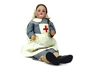 Lot 1633 - AN EARLY 20TH CENTURY BISQUE HEADED DOLL