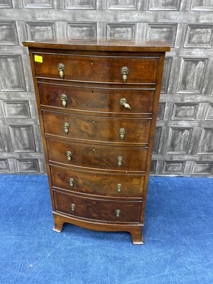 Lot 232 - A BURR WALNUT BOW FRONTED CHEST OF SIX DRAWERS