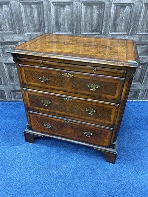 Lot 246 - A 20TH CENTURY STAINED WOOD CHEST OF THREE DRAWERS