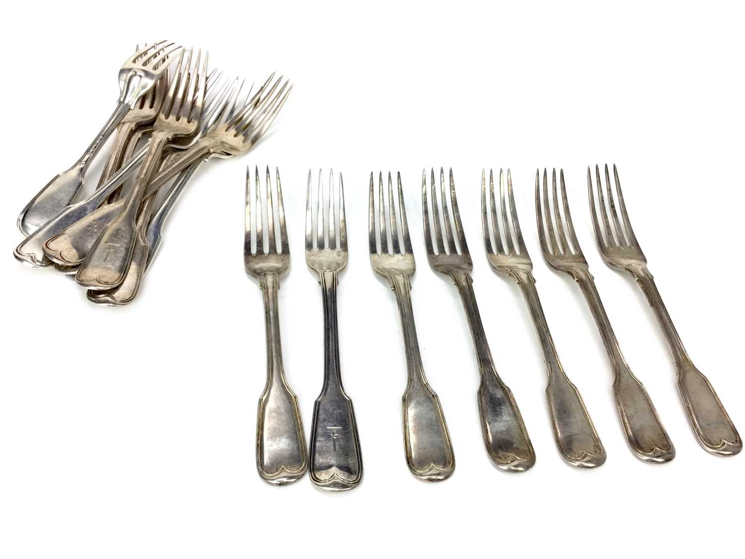 Lot 477 - A COMPOSITE SET OF FIFTEEN SILVER TABLE FORKS