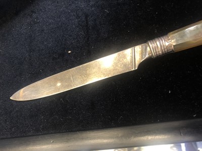 Lot 487 - A GEORGE III SILVER AND AGATE LETTER OPENER