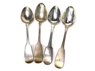 Lot 488 - A COMPOSITE SET OF FOUR SILVER TABLE SPOONS